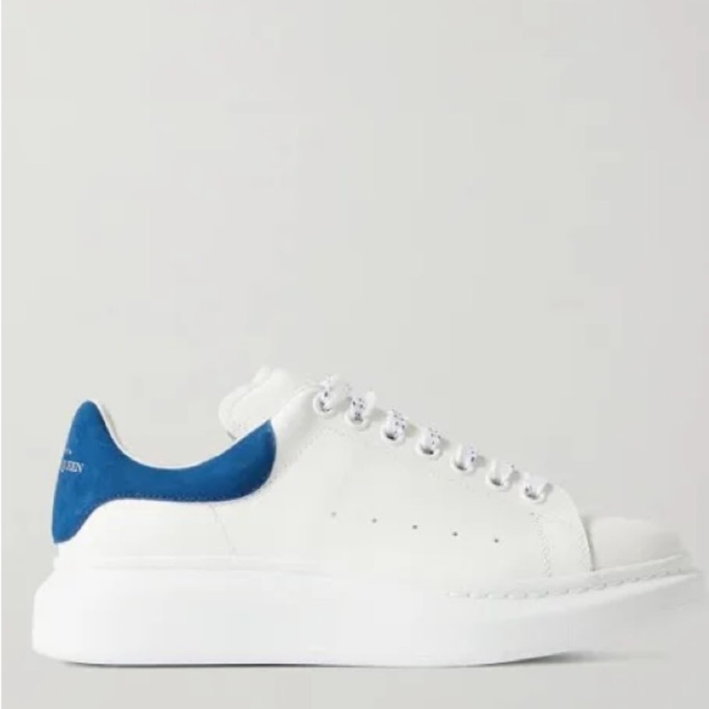 These are the blue and white Alexander McQueens in the size 4.5 good condition.